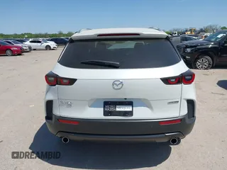 2024 Mazda CX-50 S Select с VIN 7MMVABAM9RN238736, выставлен на аукционе IAAI как лот 42003658 с пробегом 9 880 миль миль и . История ставок и продаж доступна на DreamBid. Изображение 16.