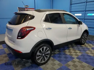 2019 Buick Encore Essence with VIN KL4CJGSM0KB895977, listed as a Copart auction lot 68799364 with 57,052 mi miles and Clean Title. Bid and sale history available at DreamBid. Image 3.