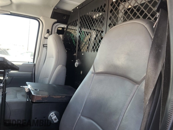 2007 Ford Econoline Cargo Commercial with VIN 1FTNE24L27DA70867, listed as a IAAI auction lot 42679230 with 173,909 mi miles and . Bid and sale history available at DreamBid. Image 15.