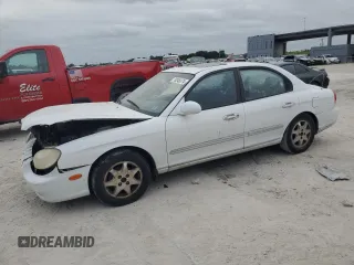 2000 Hyundai Sonata GLS with VIN KMHWF35V0YA347621, listed as a Copart auction lot 76346874 with 164,489 mi miles and Salvage Title. Bid and sale history available at carsss.com. Image 1.
