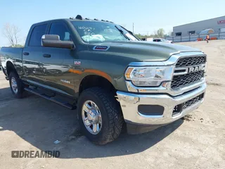 2021 Ram 2500 Tradesman z VIN 3C6UR5CJXMG560559, wystawiony jako IAAI lot #40901806 z przebiegiem 23 699 mil mil oraz . Historia ofert i sprzedaży dostępna na DreamBid. Obrazek 1.