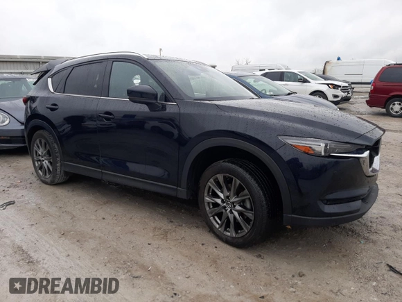 2021 Mazda CX-5 Signature with VIN JM3KFBEY8M0436075, listed as a Copart auction lot 85061194 with 66,471 mi miles and Salvage Title. Bid and sale history available at carsss.com. Image 4.