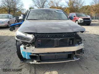 2021 BMW X2 xDrive28i with VIN WBXYJ1C07M5S21169, listed as a Copart auction lot 77829574 with 24,173 mi miles and Salvage Title. Bid and sale history available at carsss.com. Image 5.