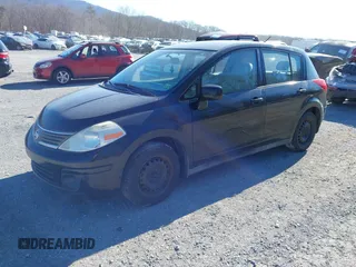 2009 Nissan Versa 1.8 SL with VIN 3N1BC13E89L490056, listed as a IAAI auction lot 41659810 with 170,335 mi miles. Bid and sale history available at carsss.com. Image 2.