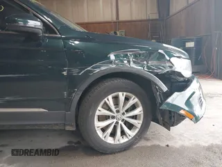 2018 Volkswagen Tiguan SEL with VIN 3VV2B7AX3JM133326, listed as a IAAI auction lot 42459190 with 94,665 mi miles and . Bid and sale history available at DreamBid. Image 6.