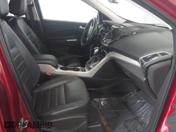 2013 Ford Escape SEL z VIN 1FMCU9HX2DUB79885, wystawiony jako IAAI lot #42341050 z przebiegiem 117 236 mil mil oraz . Historia ofert i sprzedaży dostępna na DreamBid. Obrazek 5.