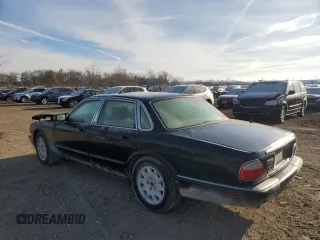 1998 Jaguar XJ with VIN SAJHX1245WC819762, listed as a Copart auction lot 81480174 with 132,491 mi miles and Salvage title. Bid and sale history available at DreamBid. Image 2.