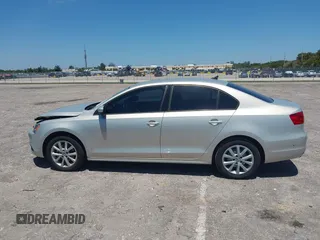 2011 Volkswagen Jetta Sedan SE w/Convenience & Sunroof with VIN 3VWDX7AJ9BM316541, listed as a IAAI auction lot 42037920 with 83,658 mi miles. Bid and sale history available at carsss.com. Image 14.