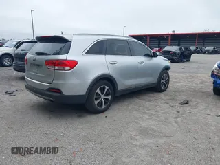 2016 Kia Sorento EX with VIN 5XYPH4A55GG041740, listed as a IAAI auction lot 41555876 with 166,255 mi miles. Bid and sale history available at carsss.com. Image 4.