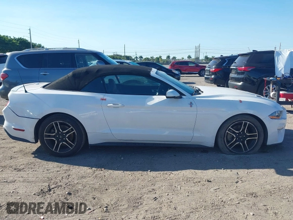 2019 Ford Mustang EcoBoost z VIN 1FATP8UH8K5162526, wystawiony jako IAAI lot #41846704 z przebiegiem 84 527 mil mil oraz . Historia ofert i sprzedaży dostępna na DreamBid. Obrazek 14.