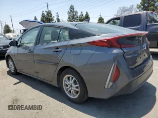 2021 Toyota Prius LE z VIN JTDKAMFPXM3174518, wystawiony jako Copart lot #58854495 z przebiegiem 83 445 mil mil oraz Szkoda całkowita • Salvage title. Historia ofert i sprzedaży dostępna na DreamBid. Obrazek 2.