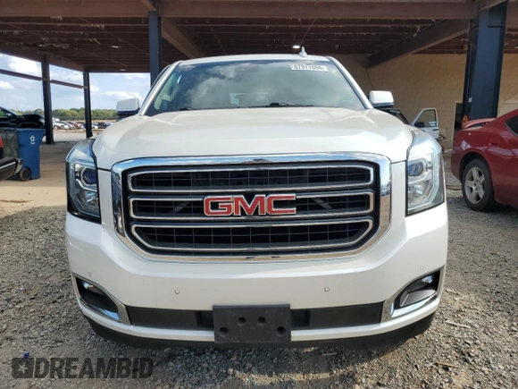 2015 GMC Yukon SLT with VIN 1GKS2BKC1FR736203, listed as a Copart auction lot 67977694 with 178,781 mi miles and Salvage Title. Bid and sale history available at carsss.com. Image 5.