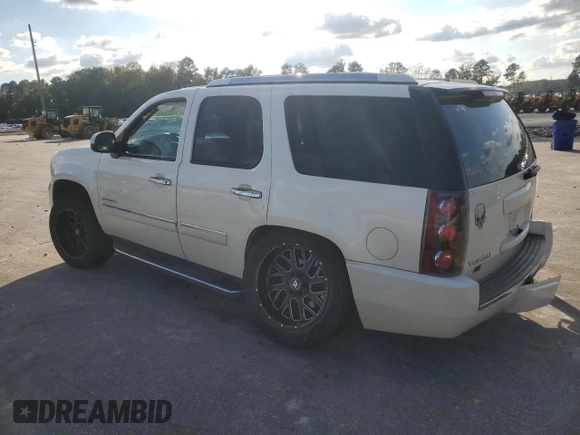 2014 GMC Yukon Denali with VIN 1GKS2EEF0ER141638, listed as a Copart auction lot 74247634 with 160,671 mi miles and Salvage Title. Bid and sale history available at carsss.com. Image 2.