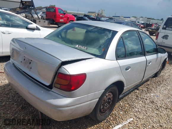 2002 Saturn SL with VIN 1G8ZF52842Z147985, listed as a IAAI auction lot 42601452 with 50,301 mi miles and . Bid and sale history available at DreamBid. Image 4.