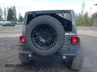 2021 Jeep Wrangler Unlimited Rubicon with VIN 1C4HJXFG9MW531858, listed as a IAAI auction lot 42001095 with 38,240 mi miles and . Bid and sale history available at DreamBid. Image 16.
