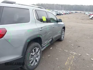 2023 GMC Acadia SLT with VIN 1GKKNML48PZ156202, listed as a IAAI auction lot 41526629 with 29,460 mi miles and . Bid and sale history available at DreamBid. Image 18.
