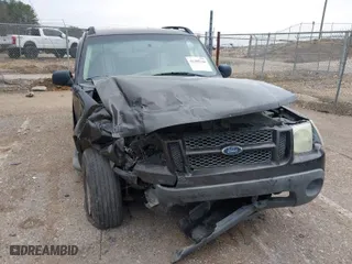 2005 Ford Explorer Sport Trac XLS with VIN 1FMZU67K25UB80616, listed as a IAAI auction lot 41505344 with 160,667 mi miles. Bid and sale history available at carsss.com. Image 6.