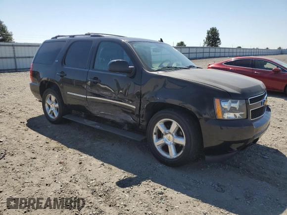 2010 Chevrolet Tahoe LTZ with VIN 1GNUKCE08AR117979, listed as a Copart auction lot 64802225 with 228,769 mi miles and Salvage title. Bid and sale history available at DreamBid. Image 4.