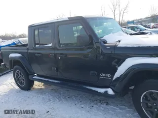 2023 Jeep Gladiator Overland with VIN 1C6HJTFG1PL553343, listed as a IAAI auction lot 41349518 with 19,556 mi miles. Bid and sale history available at carsss.com. Image 13.