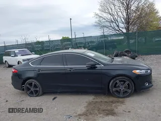 2016 Ford Fusion SE with VIN 3FA6P0HD0GR205184, listed as a IAAI auction lot 42044218 with 136,262 mi miles. Bid and sale history available at carsss.com. Image 14.
