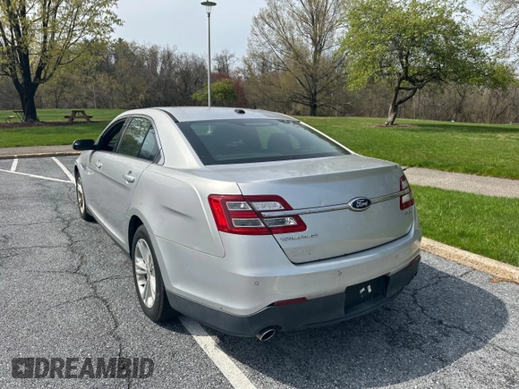 2013 Ford Taurus SEL with VIN 1FAHP2E85DG199414, listed as a Copart auction lot 54572685 with 122,416 mi miles and Clean Title. Bid and sale history available at carsss.com. Image 3.