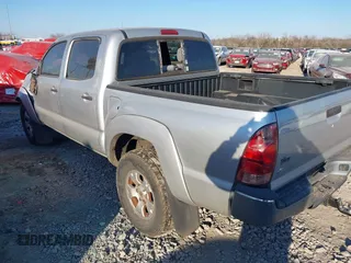 2008 Toyota Tacoma PreRunner with VIN 3TMJU62N38M062716, listed as a IAAI auction lot 41275247 with 234,768 mi miles. Bid and sale history available at carsss.com. Image 3.
