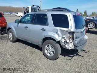 2010 Ford Escape XLT with VIN 1FMCU9D70AKD46774, listed as a IAAI auction lot 41857882 with 93,409 mi miles. Bid and sale history available at carsss.com. Image 3.