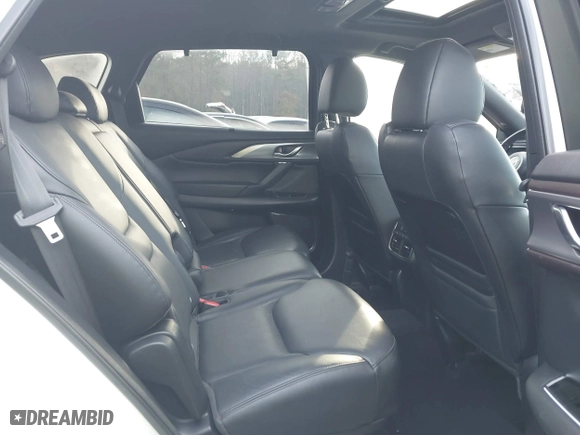 2016 Mazda CX-9 Grand Touring with VIN JM3TCBDY3G0116309, listed as a IAAI auction lot 40890199 with 64,948 mi miles. Bid and sale history available at carsss.com. Image 8.