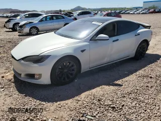 2017 Tesla Model S 60 с VIN 5YJSA1E13HF190581, выставлен на аукционе Copart как лот 57383595 с пробегом 88 219 миль миль и Списание • Salvage title. История ставок и продаж доступна на DreamBid. Изображение 1.