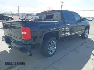2014 GMC Sierra 1500 Denali z VIN 3GTU2WEJ1EG339532, wystawiony jako IAAI lot #41776273 z przebiegiem 238 250 mil mil oraz . Historia ofert i sprzedaży dostępna na DreamBid. Obrazek 4.