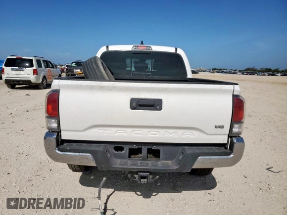 2021 Toyota Tacoma SR с VIN 5TFCZ5AN7MX268938, выставлен на аукционе Copart как лот 61241295 с пробегом 61 747 миль миль и Списание • Salvage title. История ставок и продаж доступна на DreamBid. Изображение 6.