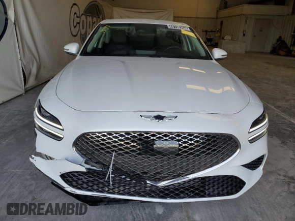 2023 Genesis G70 2.0T with VIN KMTG34TA8PU131652, listed as a Copart auction lot 48738254 with 9,713 mi miles and Non Repairable. Bid and sale history available at DreamBid. Image 5.