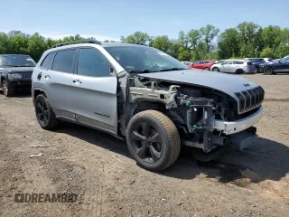 2016 Jeep Cherokee Altitude with VIN 1C4PJMCB2GW225883, listed as a Copart auction lot 55726885 with 142,802 mi miles and Salvage title. Bid and sale history available at DreamBid. Image 4.