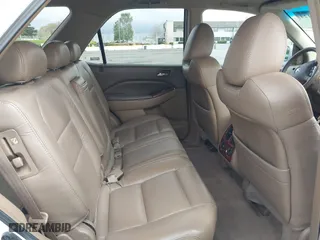 2004 Acura MDX Touring Pkg w/Navigation with VIN 2HNYD18834H520180, listed as a IAAI auction lot 41934124 with 201,817 mi miles. Bid and sale history available at carsss.com. Image 8.