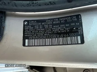 1998 BMW 5 Series 528iA with VIN WBADD6320WBW46302, listed as a Copart auction lot 45062025 with 42,667 mi miles and Salvage Title. Bid and sale history available at carsss.com. Image 10.