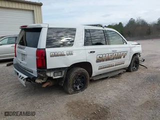 2020 Chevrolet Tahoe Commercial with VIN 1GNLCDEC7LR199179, listed as a IAAI auction lot 41502623 with 87,271 mi miles. Bid and sale history available at carsss.com. Image 4.