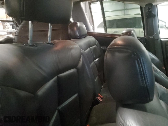1997 Jeep Grand Cherokee Limited with VIN 1J4GZ78Y4VC589688, listed as a Copart auction lot 84673974 with 183,930 mi miles and Salvage Title. Bid and sale history available at carsss.com. Image 11.