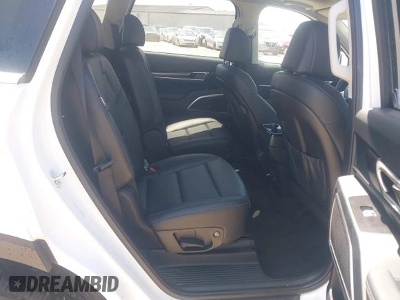 2025 Kia Telluride S with VIN 5XYP6DGC0SG590900, listed as a IAAI auction lot 42706596 with 6,712 mi miles and . Bid and sale history available at DreamBid. Image 8.