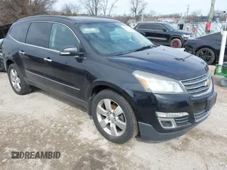 2013 Chevrolet Traverse LTZ z VIN 1GNKVLKDXDJ161457, wystawiony jako IAAI lot #41863505 z przebiegiem 218 829 mil mil oraz . Historia ofert i sprzedaży dostępna na DreamBid. Obrazek 1.