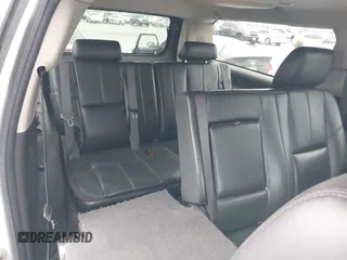 2012 Chevrolet Suburban LT with VIN 1GNSCJE00CR165813, listed as a IAAI auction lot 42494042 with 205,998 mi miles and . Bid and sale history available at DreamBid. Image 8.