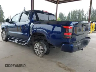 2023 Nissan Frontier SV with VIN 1N6ED1EJ3PN631272, listed as a IAAI auction lot 42282570 with 50,982 mi miles and . Bid and sale history available at DreamBid. Image 3.