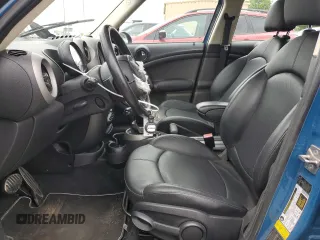 2012 MINI Countryman S with VIN WMWZC3C57CWL86423, listed as a Copart auction lot 57584195 with 102,184 mi miles and Salvage title. Bid and sale history available at DreamBid. Image 7.