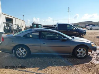 2003 Dodge Stratus SE with VIN 4B3AG42GX3E080447, listed as a IAAI auction lot 40287994 with 199,117 mi miles. Bid and sale history available at carsss.com. Image 13.