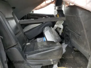 2016 Chevrolet Suburban LT z VIN 1GNSKHKC4GR285212, wystawiony jako Copart lot #58021115 z przebiegiem Nie podano mil oraz Szkoda całkowita • Salvage title. Historia ofert i sprzedaży dostępna na DreamBid. Obrazek 11.