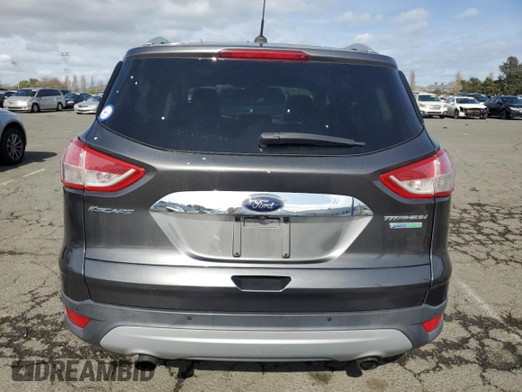 2015 Ford Escape Titanium with VIN 1FMCU0J98FUA46879, listed as a Copart auction lot 51173555 with 72,093 mi miles and Salvage Title. Bid and sale history available at DreamBid. Image 6.