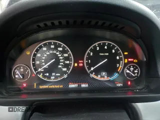 2013 BMW 5 Series 550i xDrive with VIN WBAFU9C59DDY70691, listed as a Copart auction lot 87702305 with 225,677 mi miles and Salvage Title. Bid and sale history available at carsss.com. Image 9.