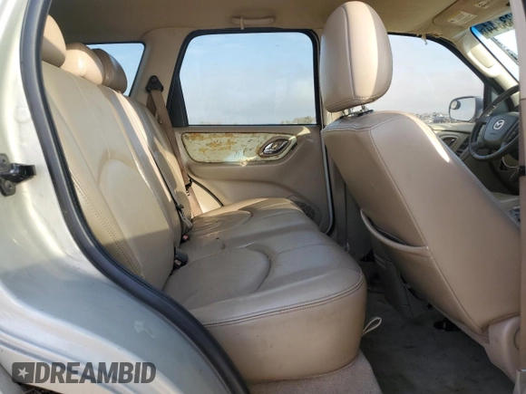 2005 Mazda Tribute i with VIN 4F2YZ02Z95KM44817, listed as a Copart auction lot 85033344 with 258,976 mi miles and Salvage Title. Bid and sale history available at carsss.com. Image 11.