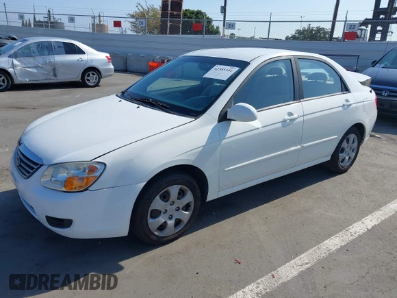 2009 Kia Spectra LX z VIN KNAFE222995623894, wystawiony jako IAAI lot #42385181 z przebiegiem 119 030 mil mil oraz . Historia ofert i sprzedaży dostępna na DreamBid. Obrazek 17.
