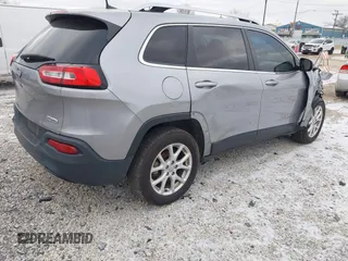 2016 Jeep Cherokee 75th Anniversary with VIN 1C4PJLCB1GW297555, listed as a IAAI auction lot 41232269 with 257,033 mi miles. Bid and sale history available at carsss.com. Image 4.