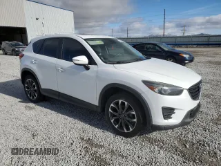 2016 Mazda CX-5 Grand Touring with VIN JM3KE4DY3G0672069, listed as a Copart auction lot 49482575 with 172,129 mi miles and Salvage Title. Bid and sale history available at DreamBid. Image 4.